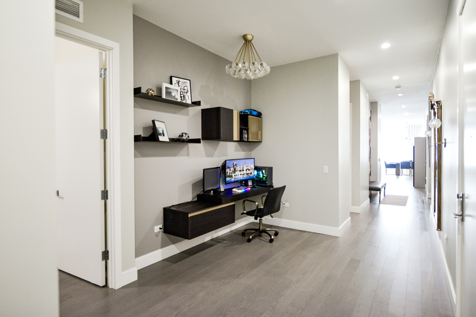 28 North Carpenter Street, Unit 2N Chicago, IL 60607 - Photo 16 of 30 a view of a hallway with workspace and a window
