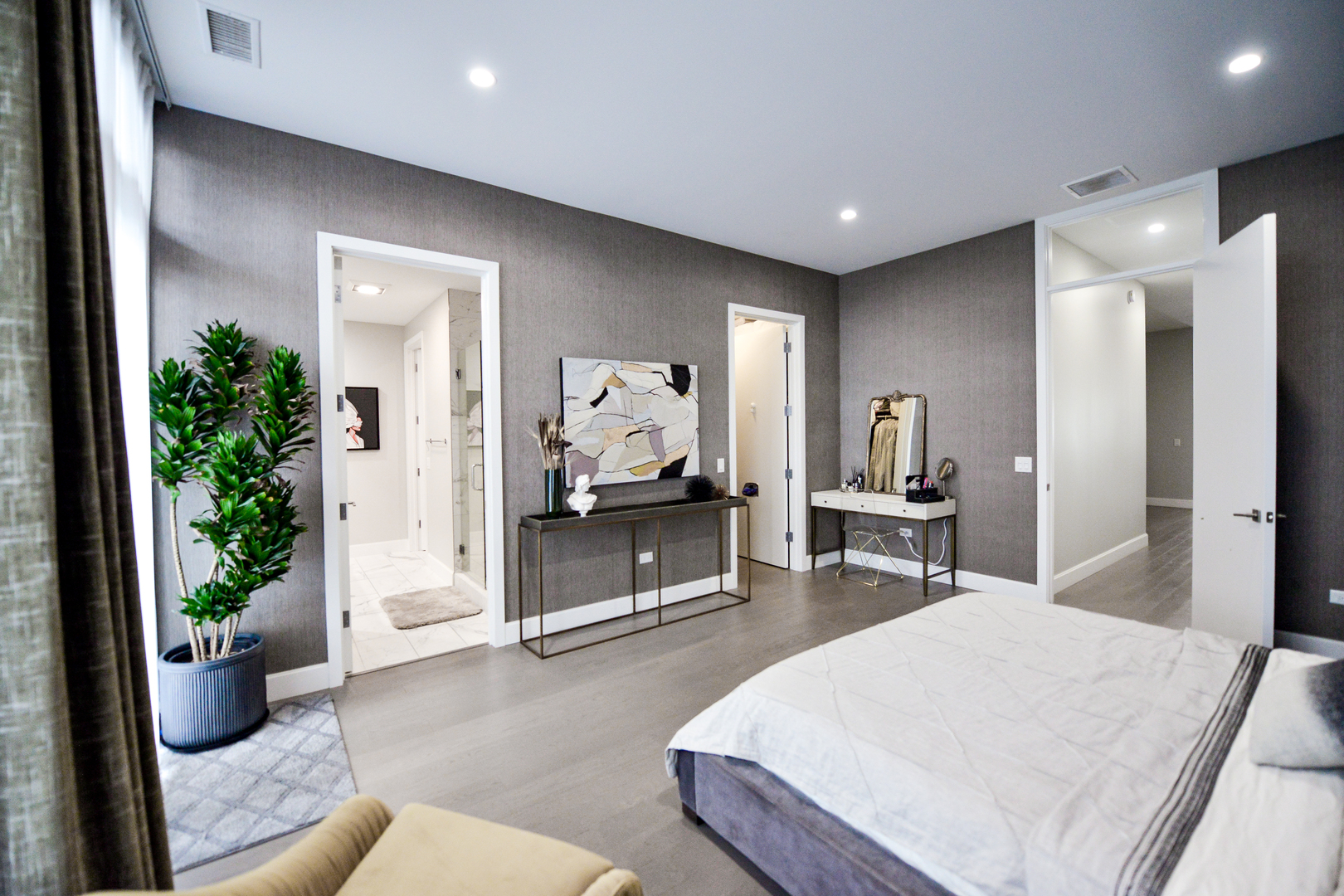 28 North Carpenter Street, Unit 2N Chicago, IL 60607 - Photo 22 of 30 a living room with furniture and potted plant