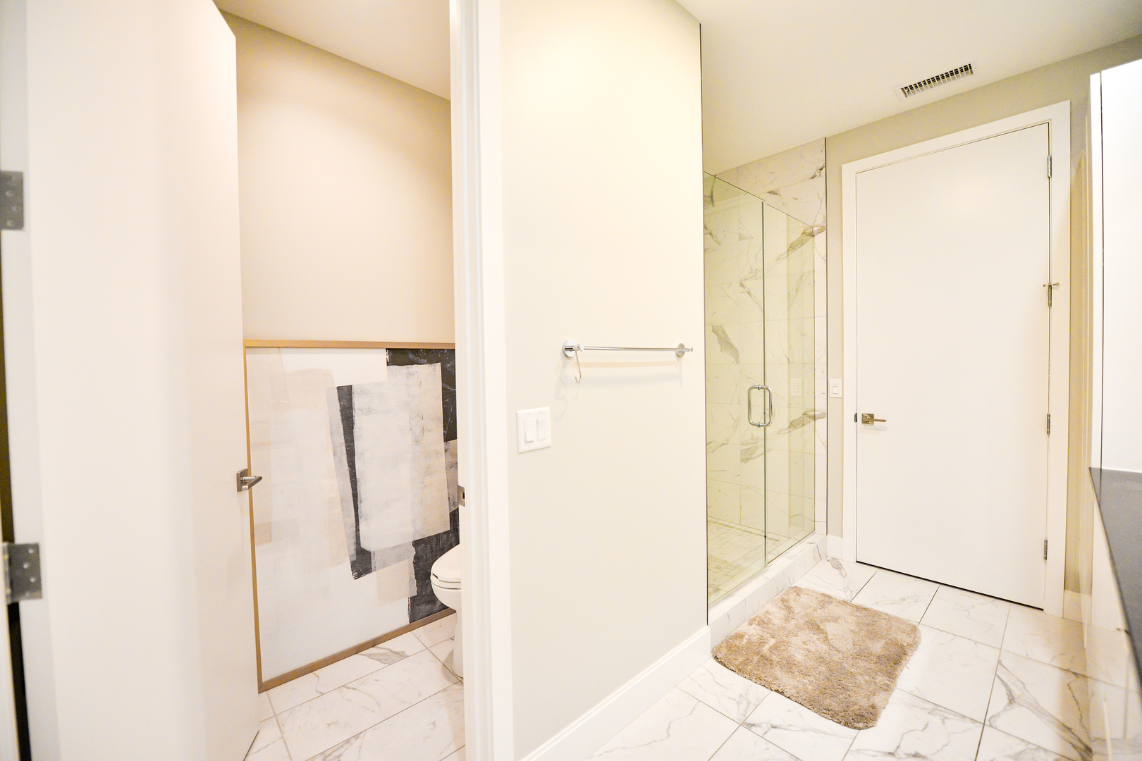 28 North Carpenter Street, Unit 2N Chicago, IL 60607 - Photo 26 of 30 a view of a bathroom with shower