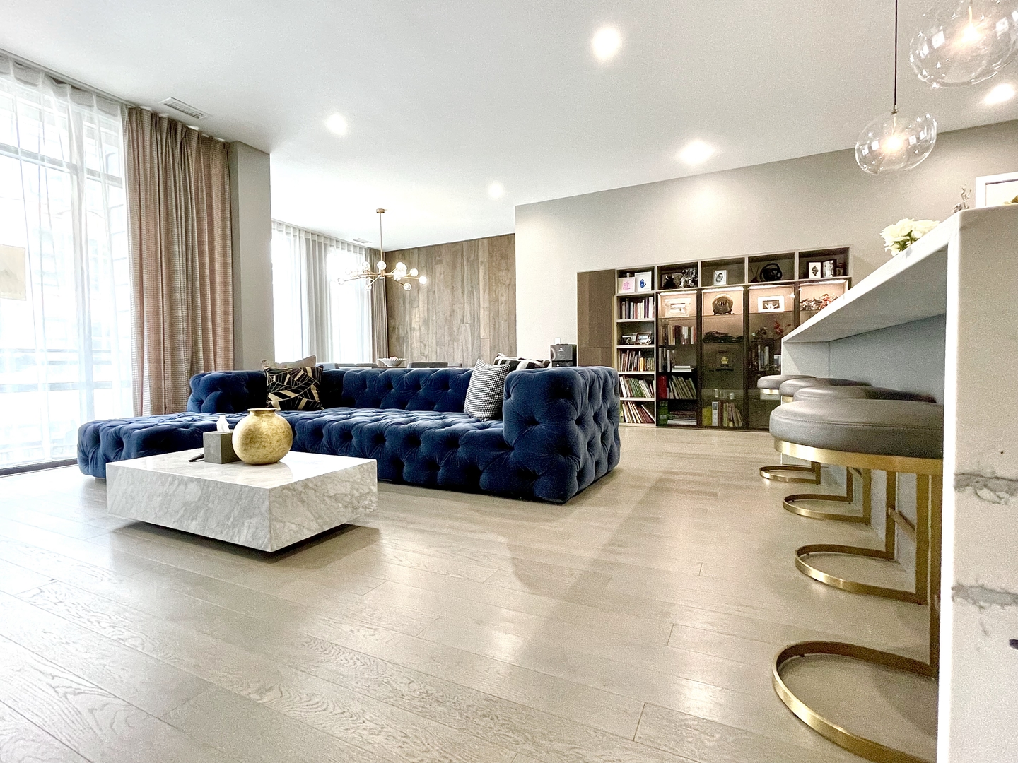 28 North Carpenter Street, Unit 2N Chicago, IL 60607 - Photo 4 of 30 a living room with furniture and a large window