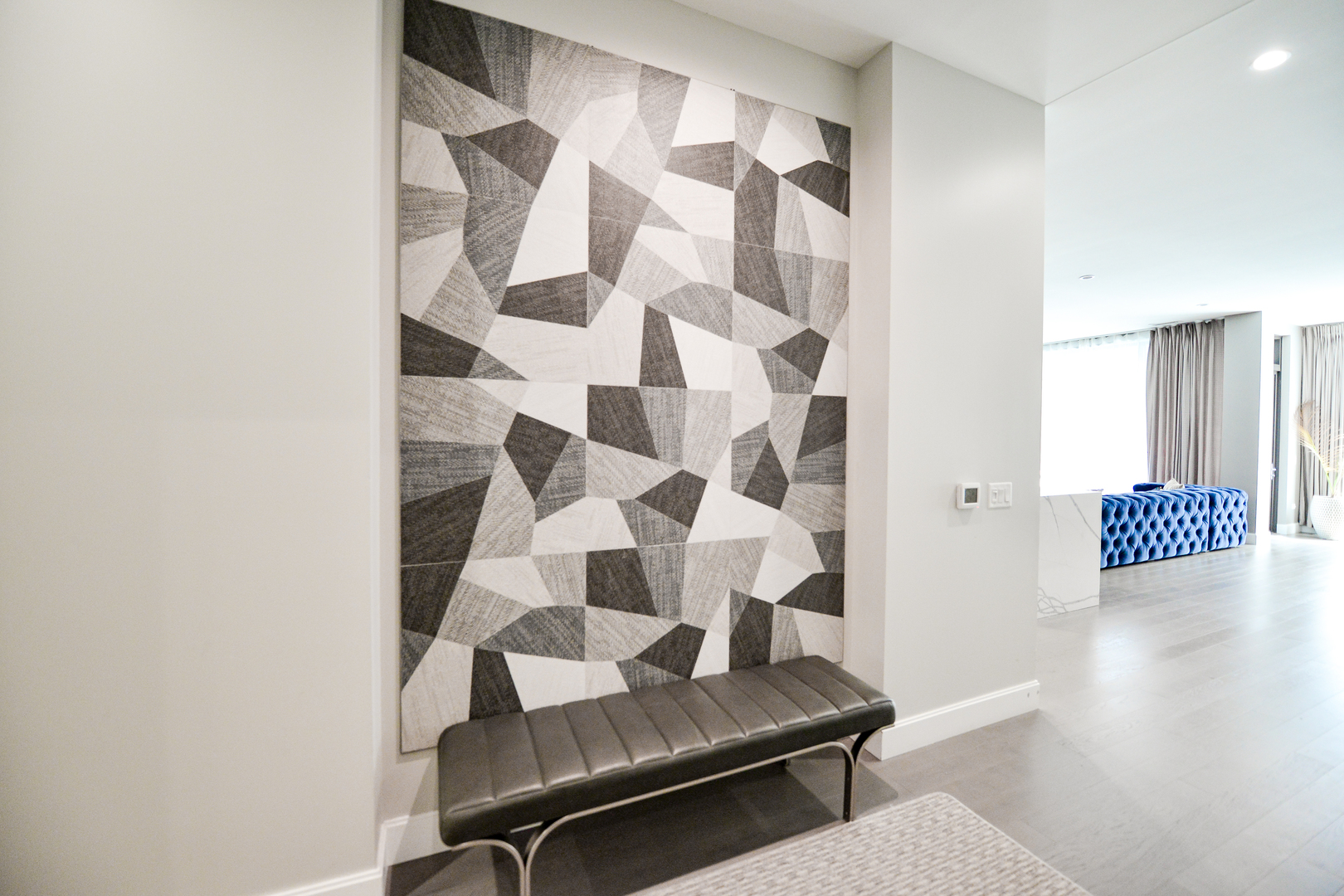 28 North Carpenter Street, Unit 2N Chicago, IL 60607 - Photo 9 of 30 a living room with a couch and a walk in closet with wooden floor