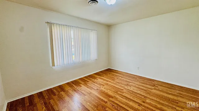an empty room with window