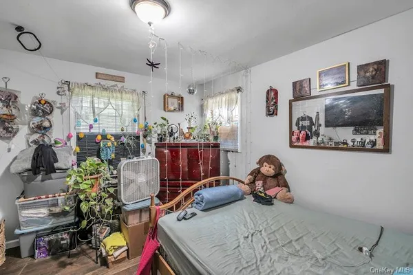 a room with lot of furniture and storage