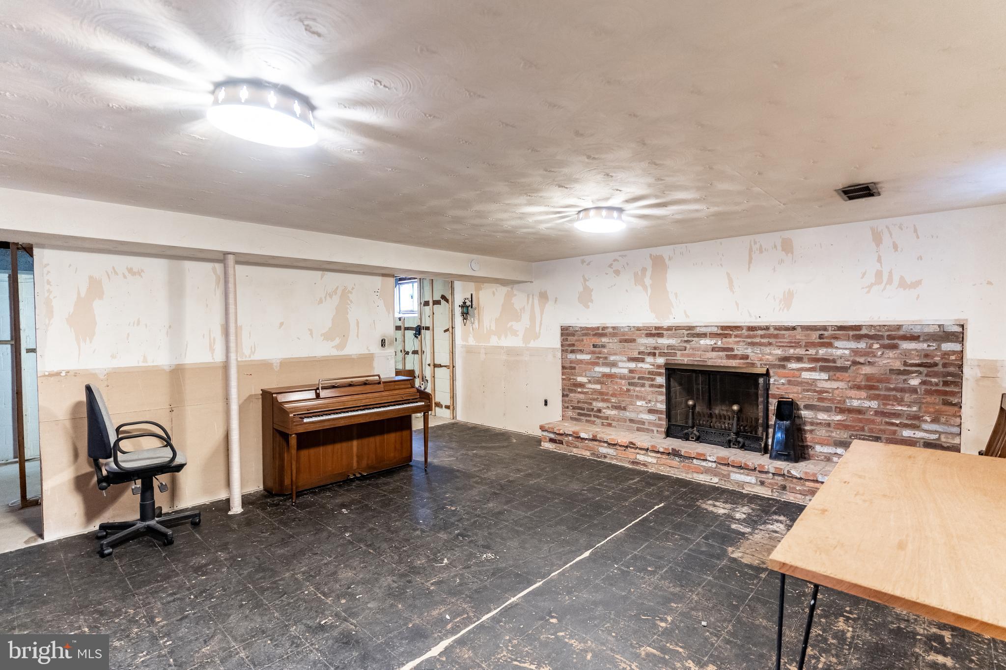 11407 Newport Mill Road Silver Spring, MD 20902 - Photo 20 of 26 Brick Surround Wood-burning Fireplace
