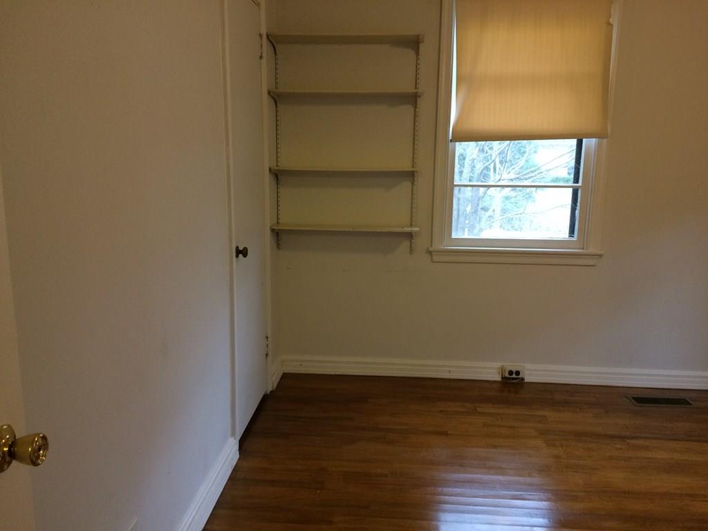 2833 Christine Road Columbus, GA 31907 - Photo 14 of 18 wooden floor in an empty room with a window