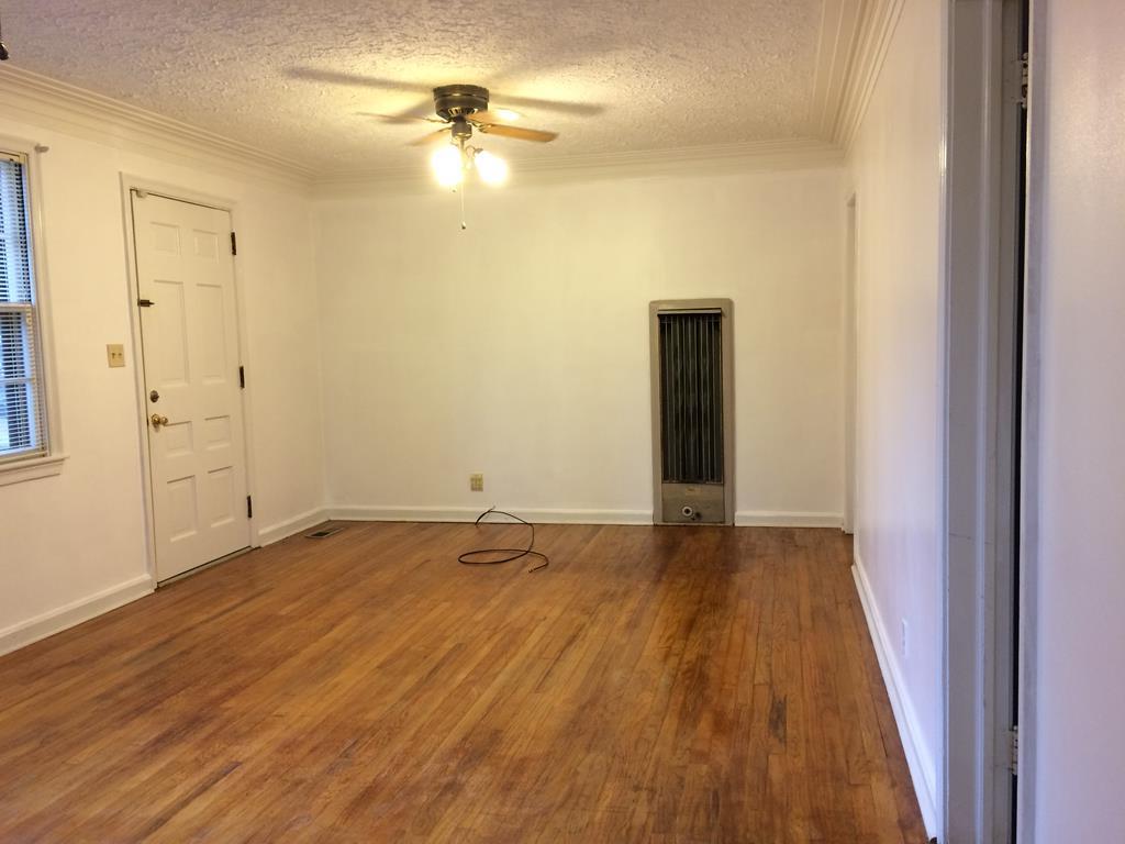 2833 Christine Road Columbus, GA 31907 - Photo 5 of 18 a view of an empty room with wooden floor