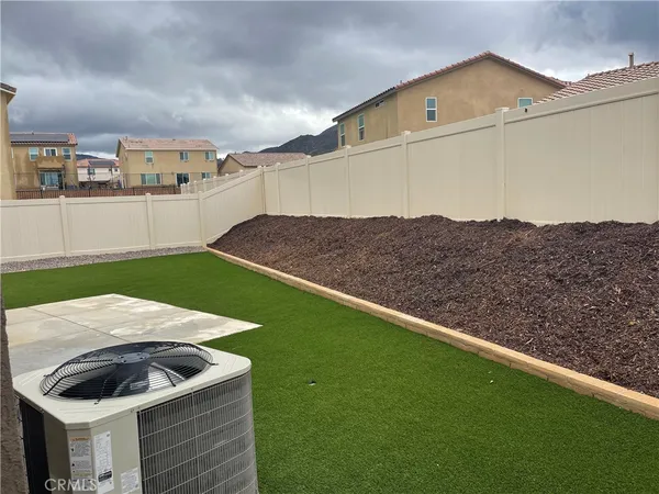 a view of a backyard with mountain view