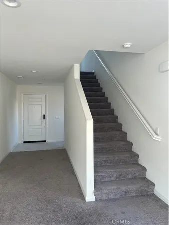 a view of an entryway with stairs
