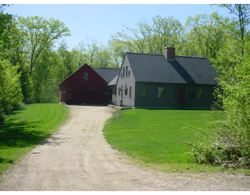 371 Jewett Road Barre, MA 01005 - Photo 1 of 1 a front view of a house with a garden