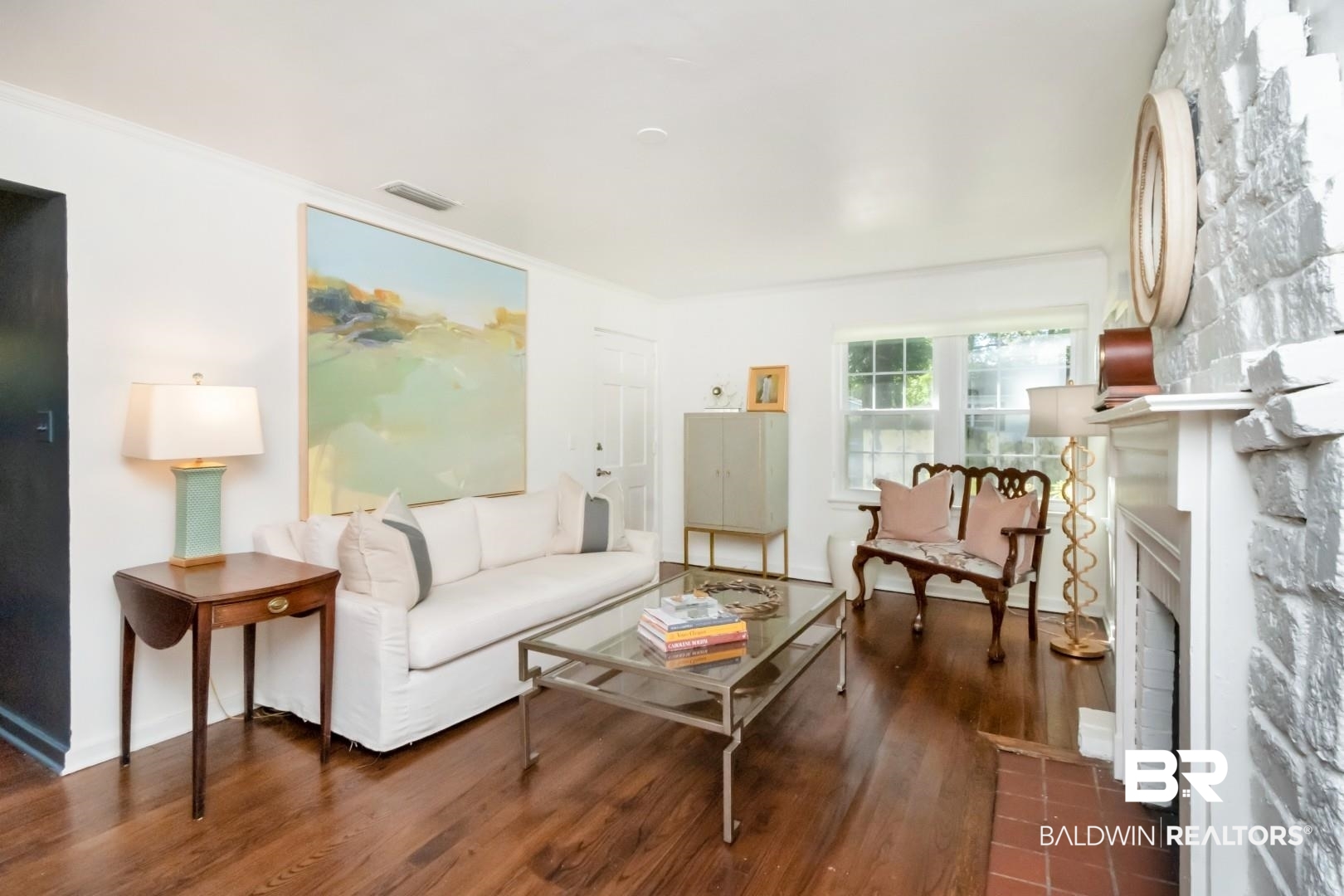18 Princess Anne Road Mobile, AL 36608 - Photo 4 of 41 Living area featuring a fireplace and dark wood-style floors