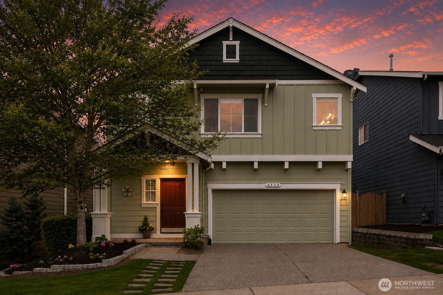4119 167th Place Southeast Bothell, WA 98012 - Photo 1 of 39 a front view of a house with a yard