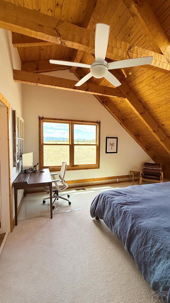 965 Newton Road Pueblo, CO 81005 - Photo 15 of 47 a bedroom with bed and window