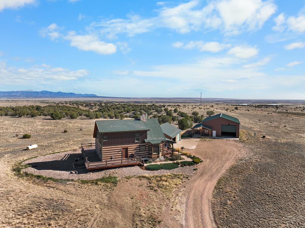 965 Newton Road Pueblo, CO 81005 - Photo 46 of 47 a view of a terrace with wooden floor and city view