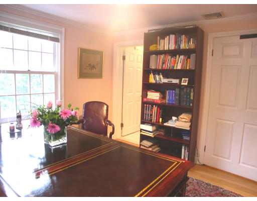 74 Pinecroft Road Weston, MA 02493 - Photo 20 of 25 a room with furniture and book shelf