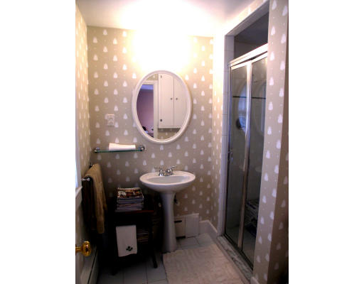 74 Pinecroft Road Weston, MA 02493 - Photo 22 of 25 a room with a sink and a mirror
