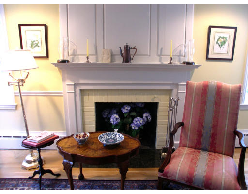 74 Pinecroft Road Weston, MA 02493 - Photo 5 of 25 a living room with furniture and a fireplace