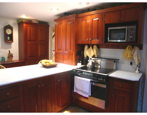74 Pinecroft Road Weston, MA 02493 - Photo 8 of 25 a kitchen with a sink cabinets and appliances