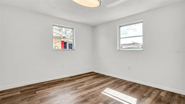 an empty room with windows