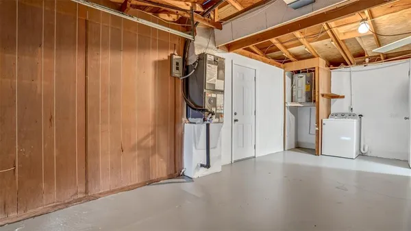 a view of a room with wooden walls