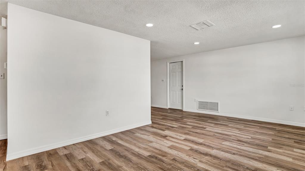 7124 Parrot Drive Port Richey, FL 34668 - Photo 6 of 29 a view of an empty room