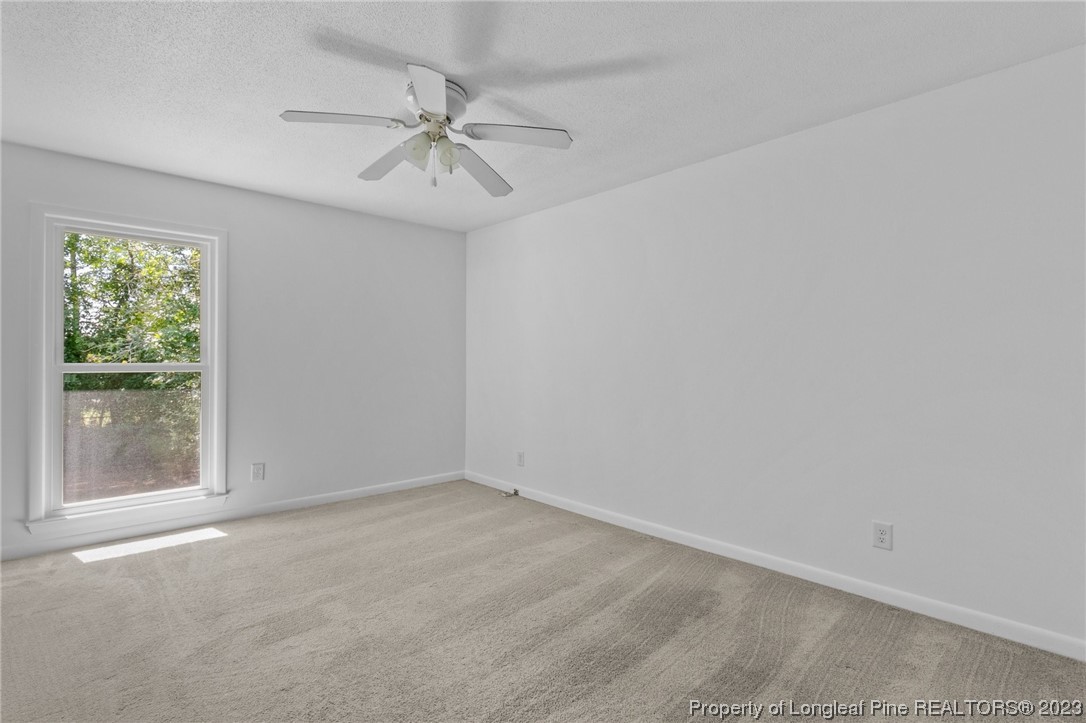3306 Arrowhead Road Spring Lake, NC 28390 - Photo 18 of 29 a view of an empty room with a window