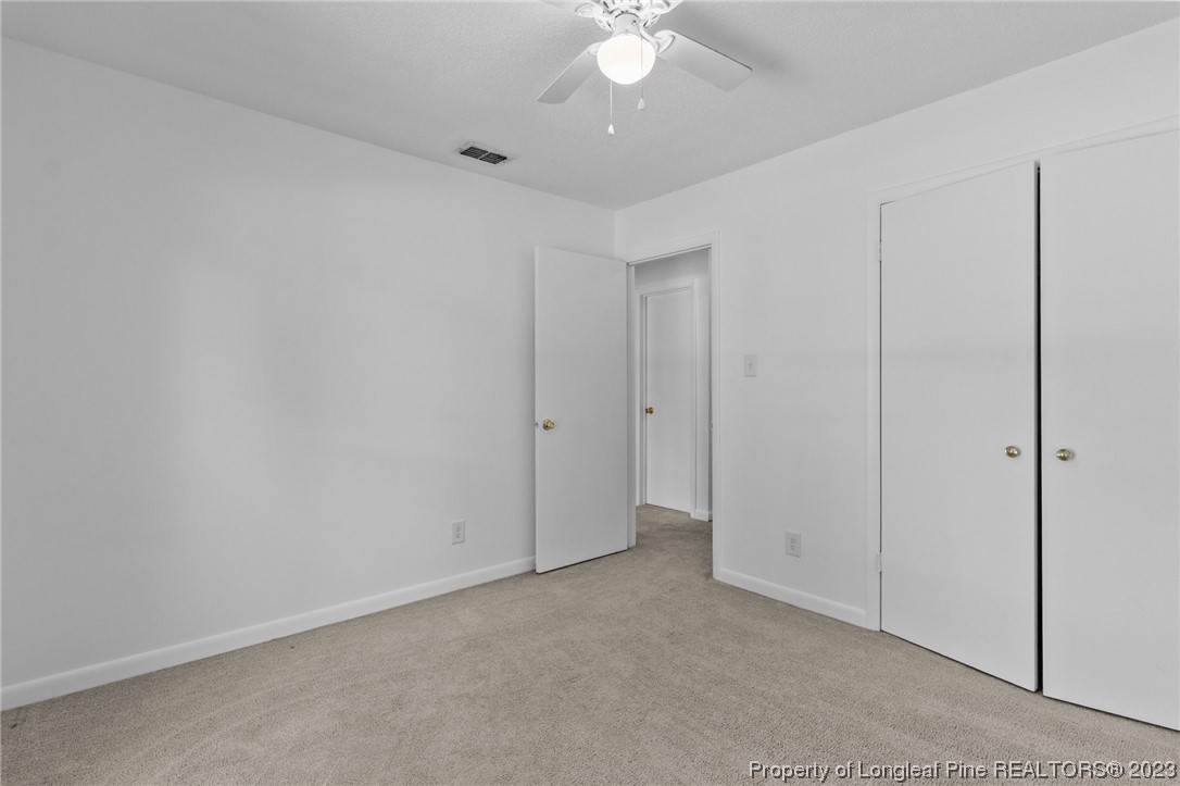 3306 Arrowhead Road Spring Lake, NC 28390 - Photo 19 of 29 a view of a livingroom with a chandelier fan