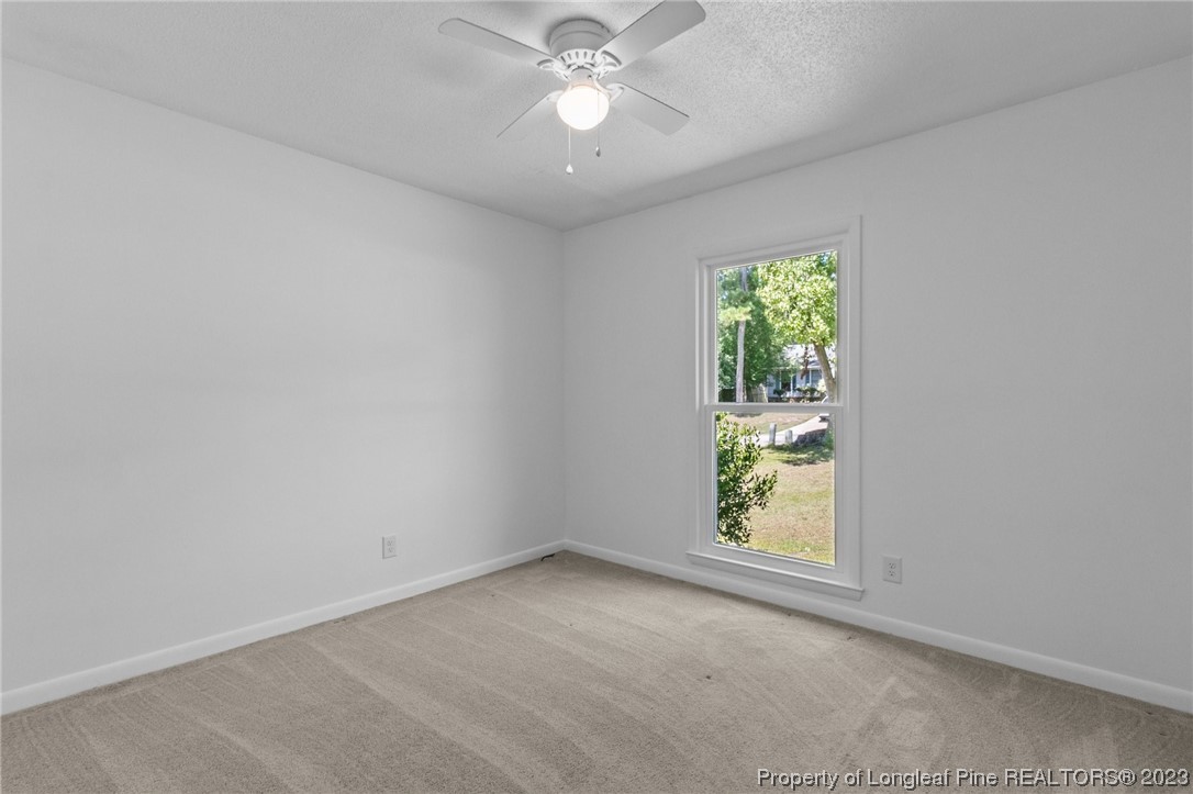 3306 Arrowhead Road Spring Lake, NC 28390 - Photo 20 of 29 an empty room with windows and closet