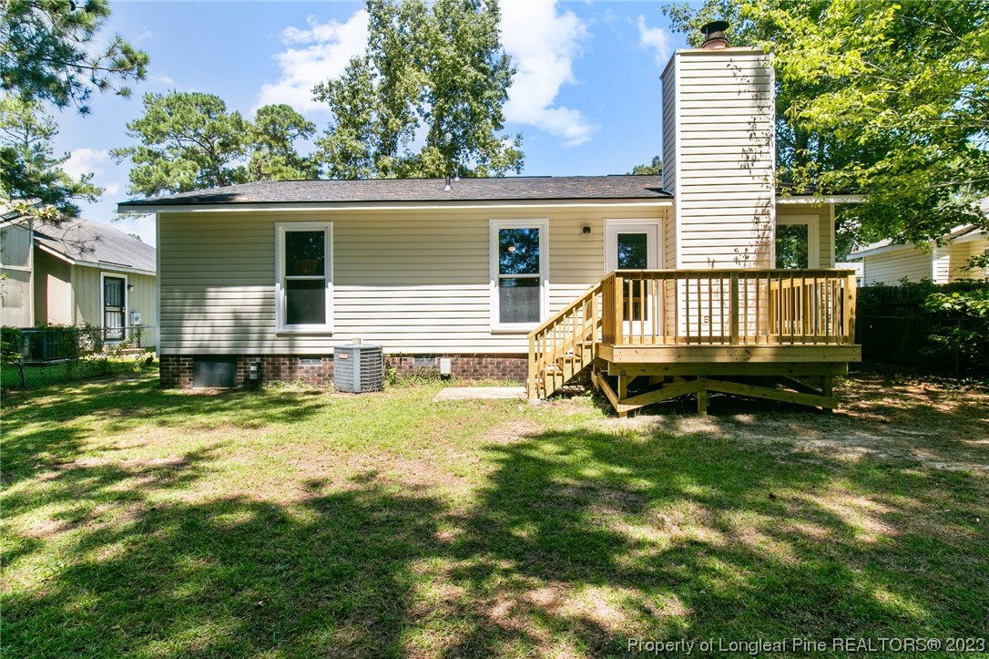 3306 Arrowhead Road Spring Lake, NC 28390 - Photo 25 of 29 front view of a house with a yard