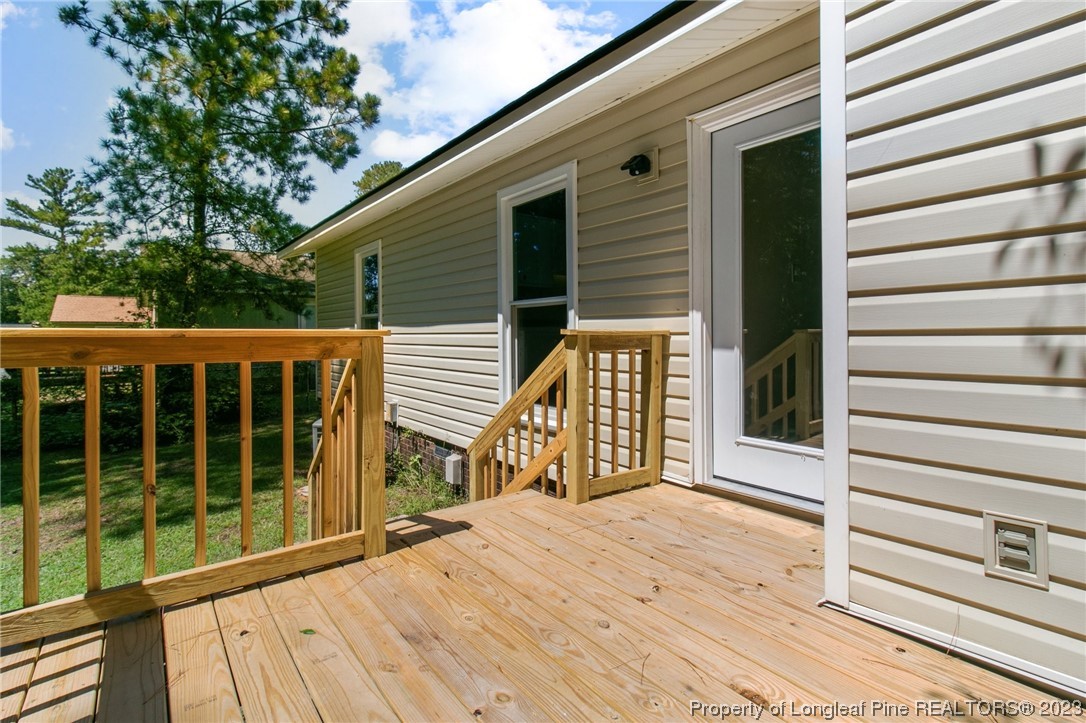 3306 Arrowhead Road Spring Lake, NC 28390 - Photo 26 of 29 a view of a house with a balcony