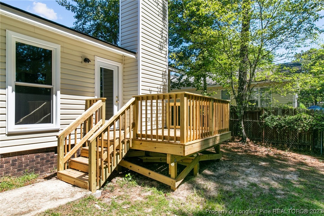 3306 Arrowhead Road Spring Lake, NC 28390 - Photo 27 of 29 a view of a house with backyard and sitting area