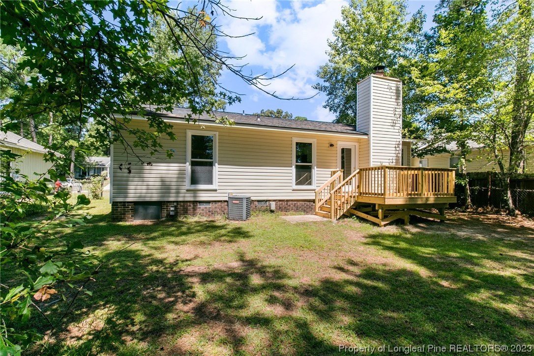 3306 Arrowhead Road Spring Lake, NC 28390 - Photo 29 of 29 a view of a house with backyard and sitting area
