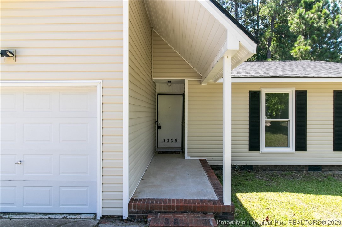 3306 Arrowhead Road Spring Lake, NC 28390 - Photo 4 of 29 a view of a house with a door