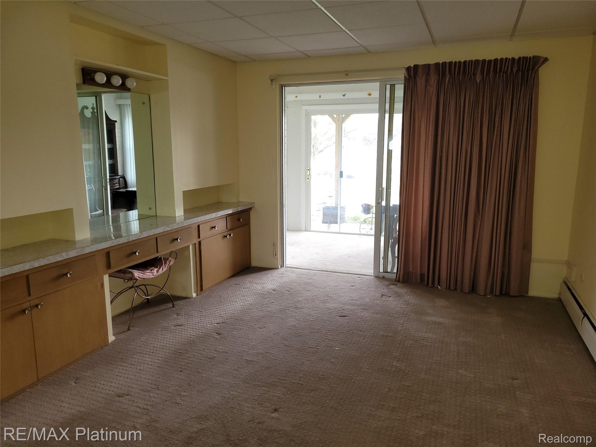 26955 Milford Road, Unit 29B New Hudson, MI 48165 - Photo 5 of 10 Bedroom2.jpg