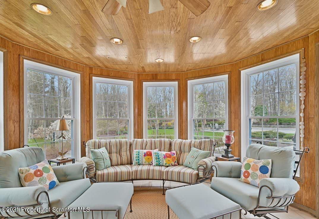 20 Goodleigh Road Dallas, PA 18612 - Photo 12 of 23 a living room with furniture and a large window