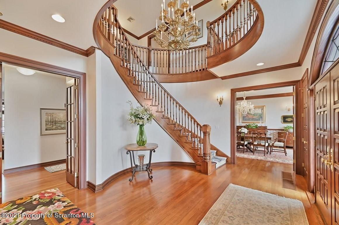 20 Goodleigh Road Dallas, PA 18612 - Photo 5 of 23 a view of entryway and hall with wooden floor