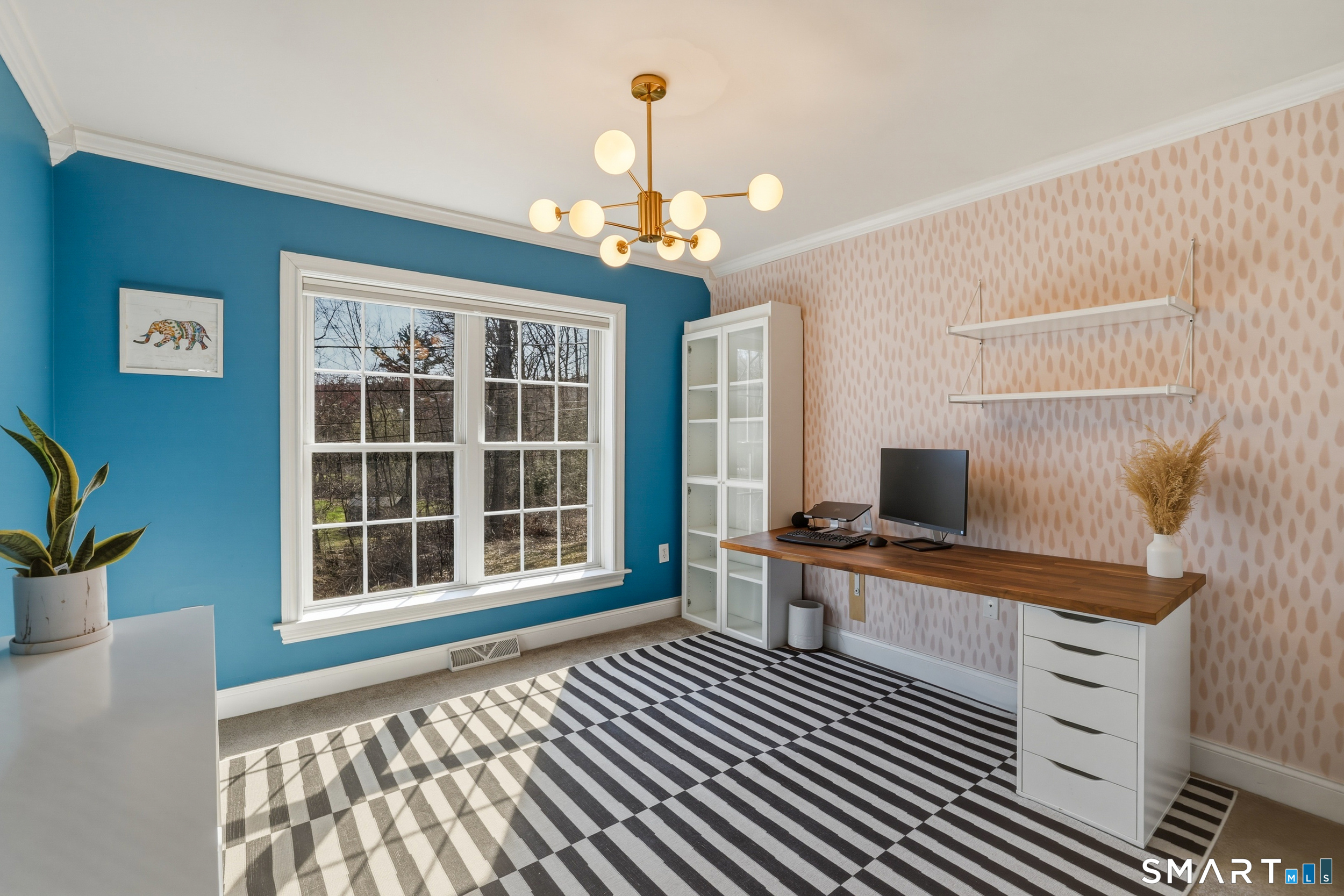 129 North Mountain Road Canton, CT 06019 - Photo 22 of 39 a view of a workspace with furniture and a window