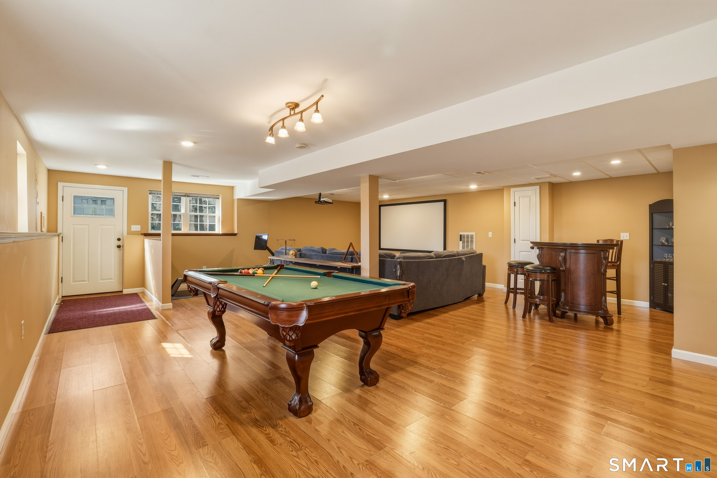 129 North Mountain Road Canton, CT 06019 - Photo 27 of 39 a room with furniture and wooden floor