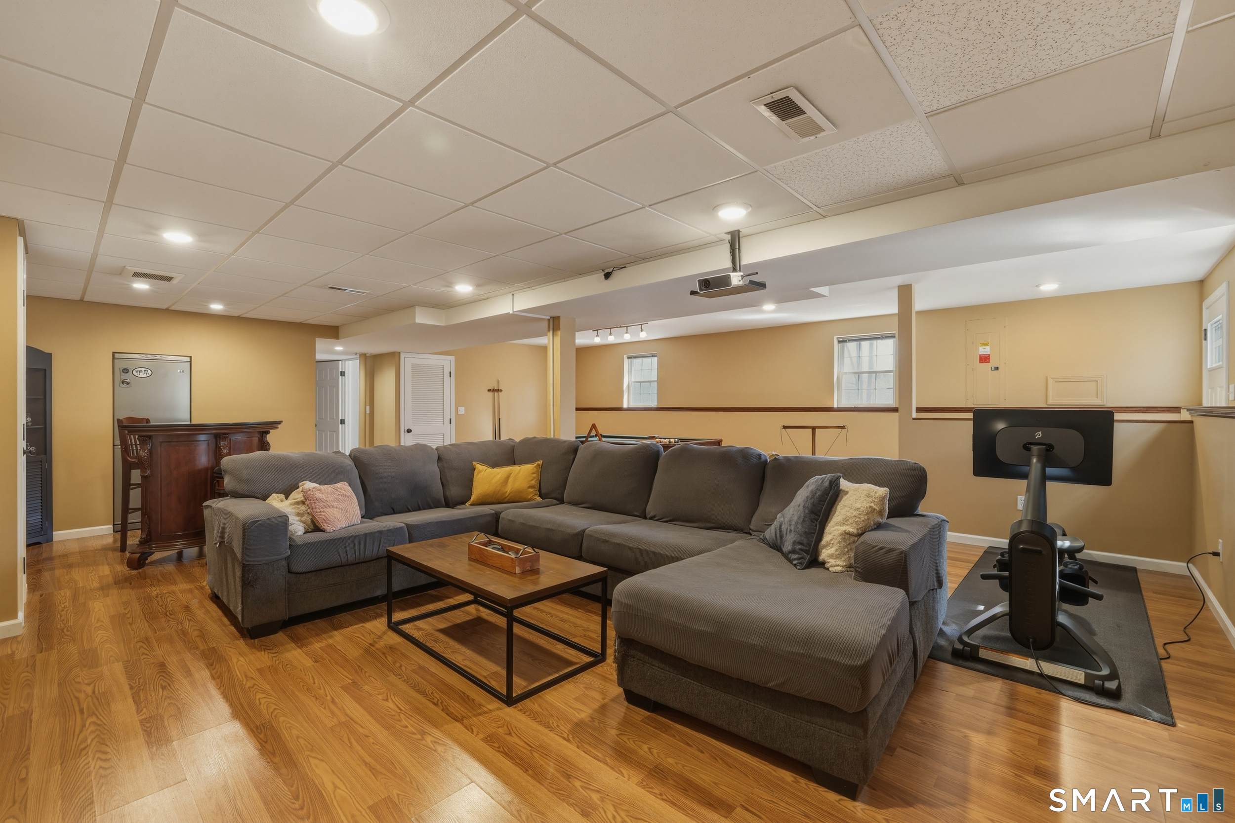 129 North Mountain Road Canton, CT 06019 - Photo 30 of 39 a living room with furniture and a wooden floor
