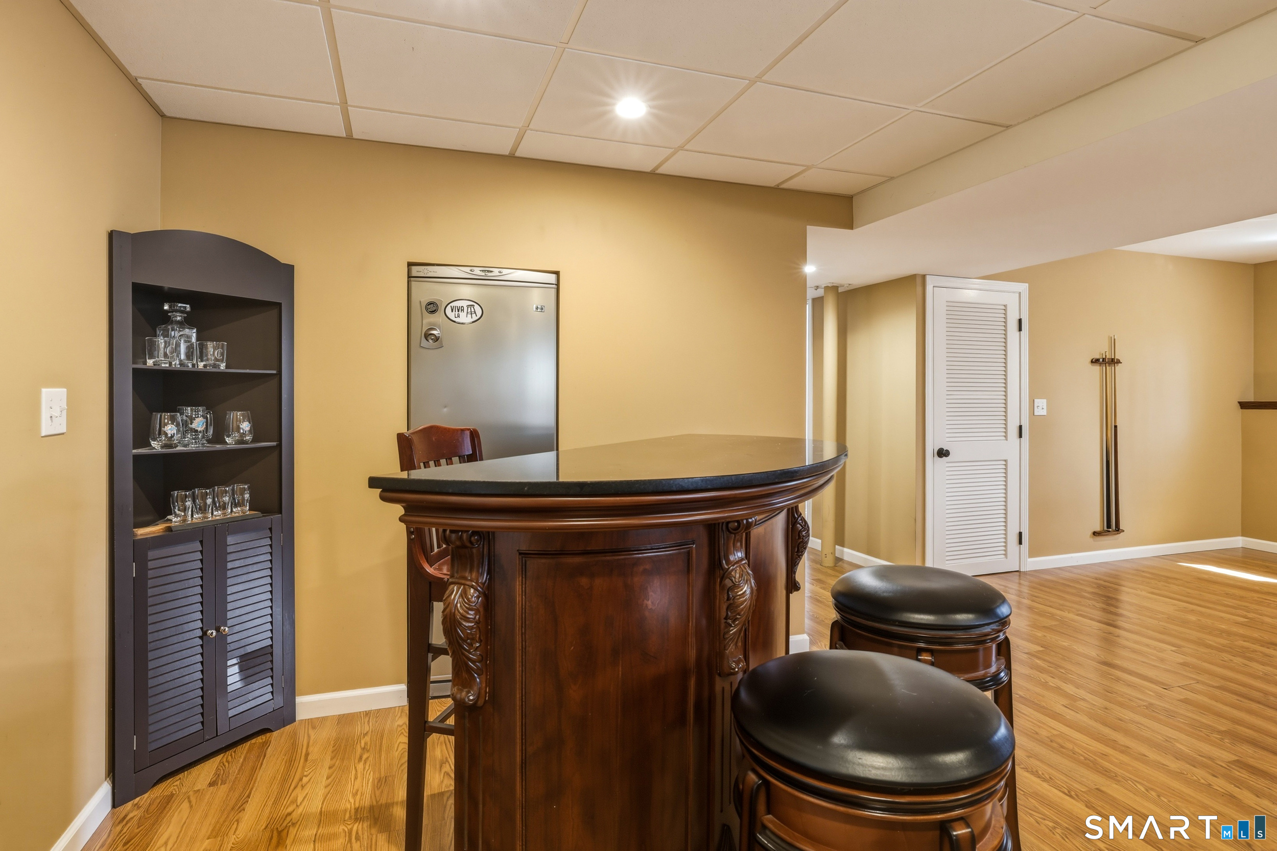 129 North Mountain Road Canton, CT 06019 - Photo 31 of 39 a living room with furniture and a wooden floor