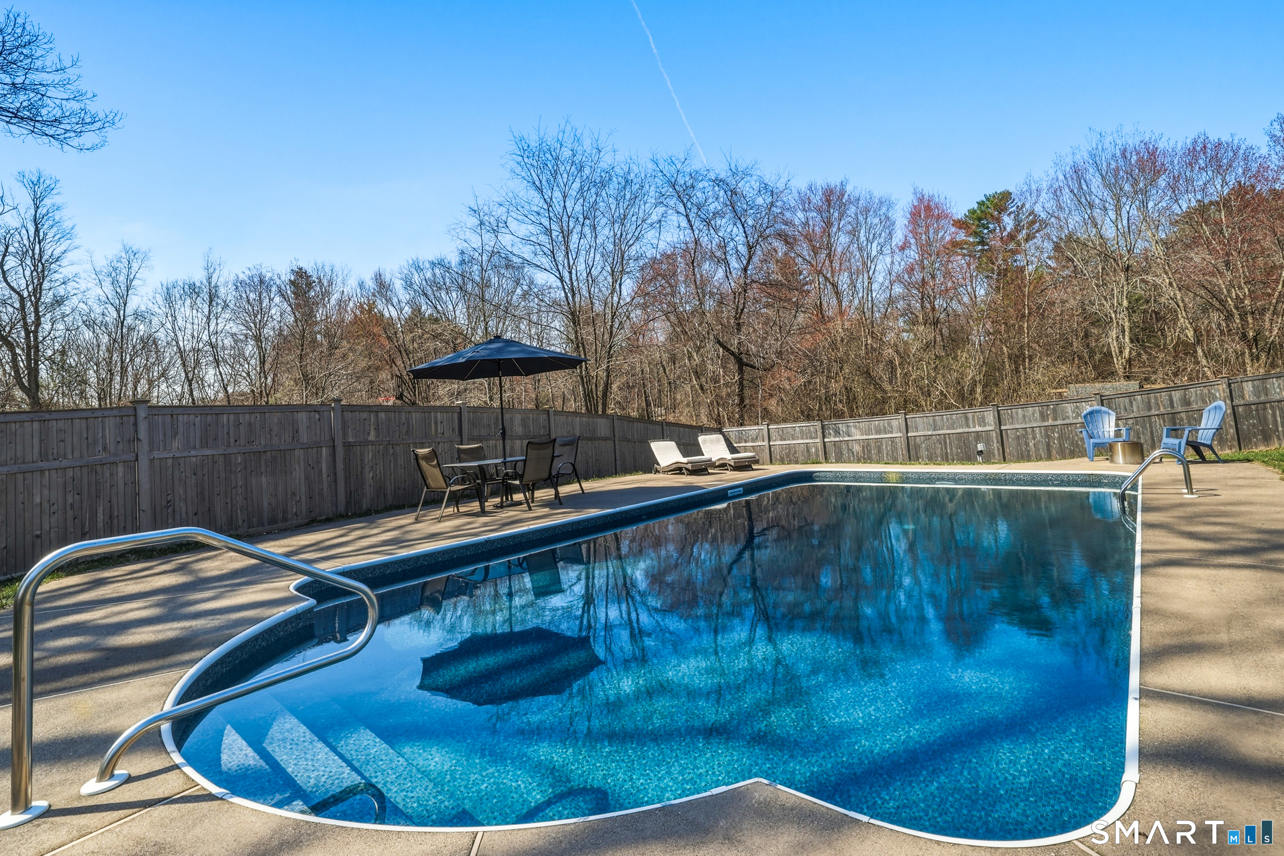 129 North Mountain Road Canton, CT 06019 - Photo 34 of 39 a view of a swimming pool with a patio