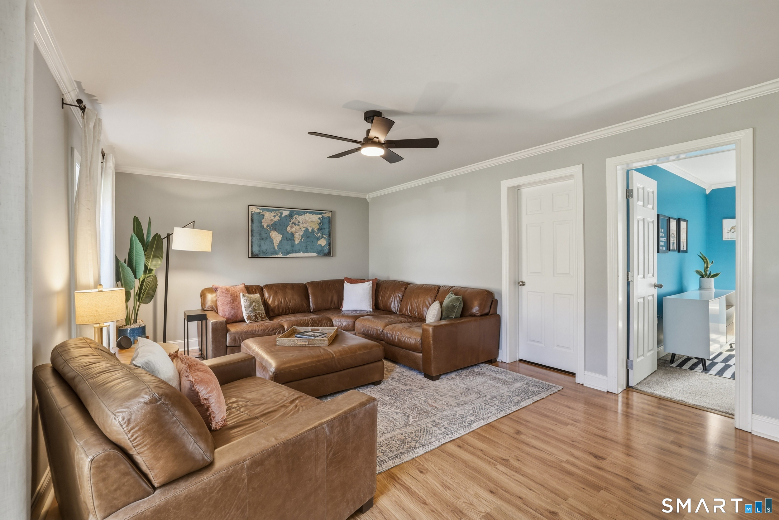 129 North Mountain Road Canton, CT 06019 - Photo 10 of 39 a living room with furniture and a ceiling fan