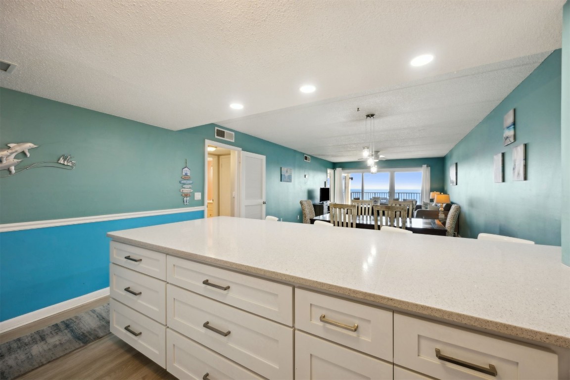 3350 South Fletcher Avenue, Unit 5D Fernandina Beach, FL 32034 - Photo 13 of 48 a view of a kitchen with cabinets