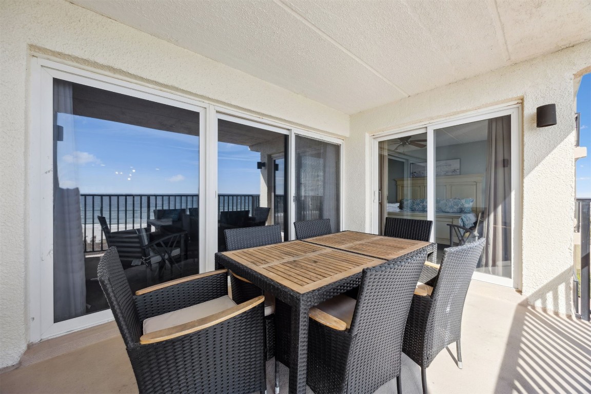3350 South Fletcher Avenue, Unit 5D Fernandina Beach, FL 32034 - Photo 26 of 48 a view of a dining room with furniture