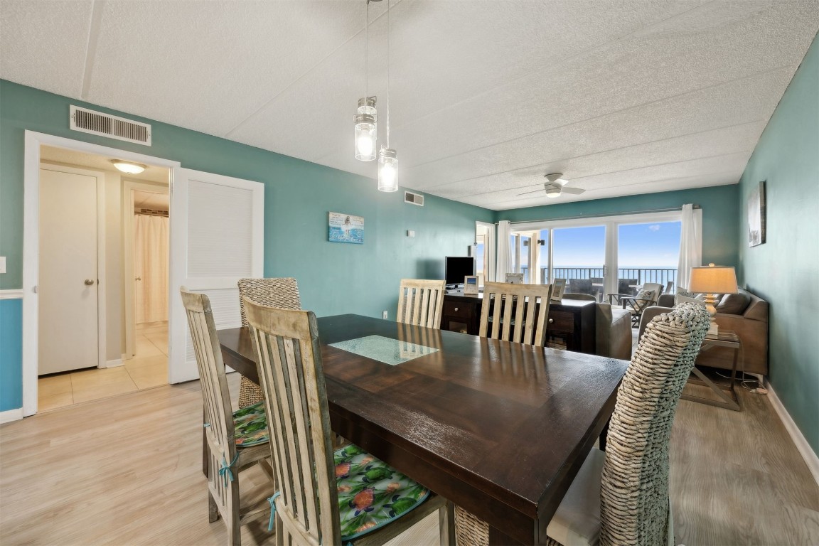 3350 South Fletcher Avenue, Unit 5D Fernandina Beach, FL 32034 - Photo 6 of 48 a view of a dining room with furniture