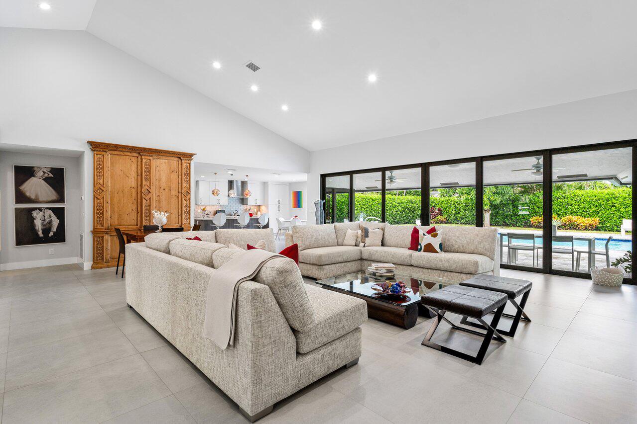 3707 Red Maple Circle Delray Beach, FL 33445 - Photo 11 of 39 a living room with furniture and a large window