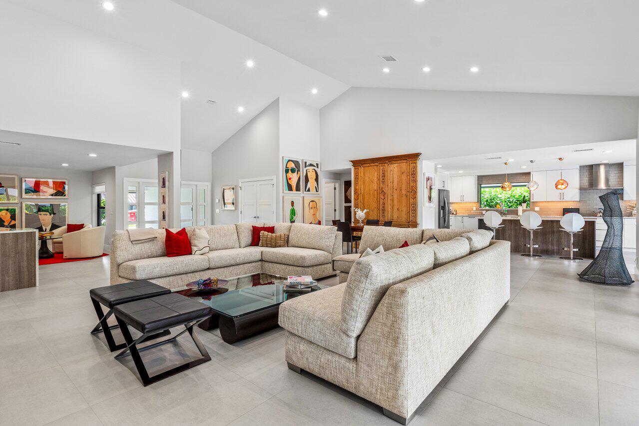3707 Red Maple Circle Delray Beach, FL 33445 - Photo 12 of 39 a living room with furniture and a wooden floor