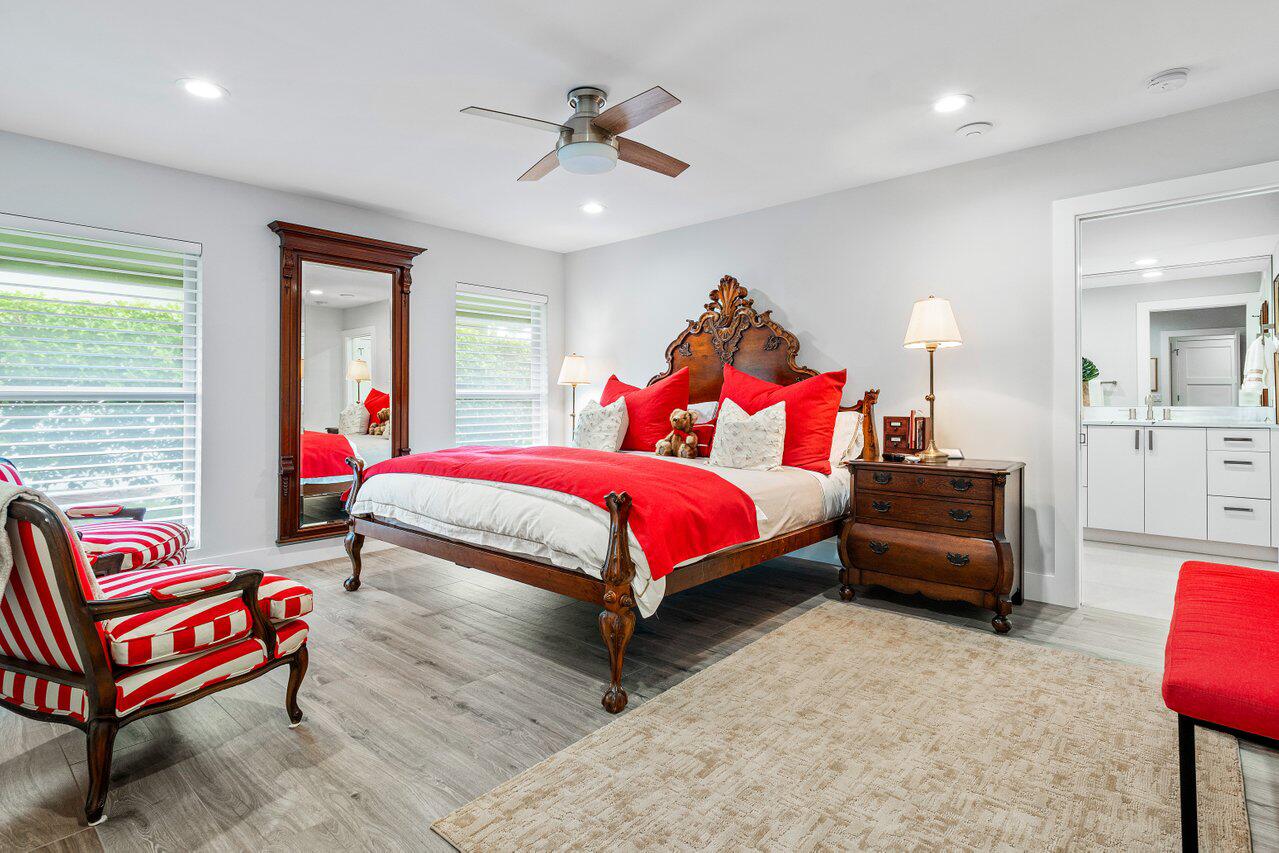 3707 Red Maple Circle Delray Beach, FL 33445 - Photo 25 of 39 a bed room with a bed and a couch