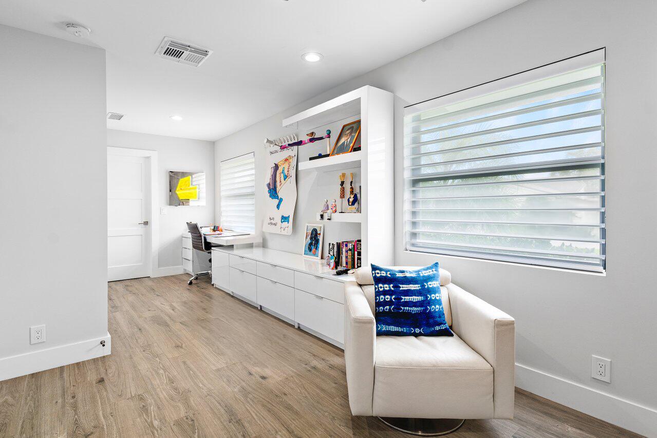 3707 Red Maple Circle Delray Beach, FL 33445 - Photo 27 of 39 a living room with furniture and a window