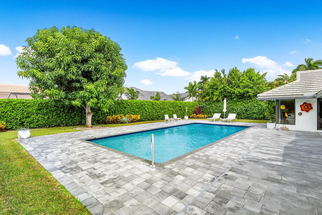 3707 Red Maple Circle Delray Beach, FL 33445 - Photo 30 of 39 a view of a swimming pool with an outdoor space