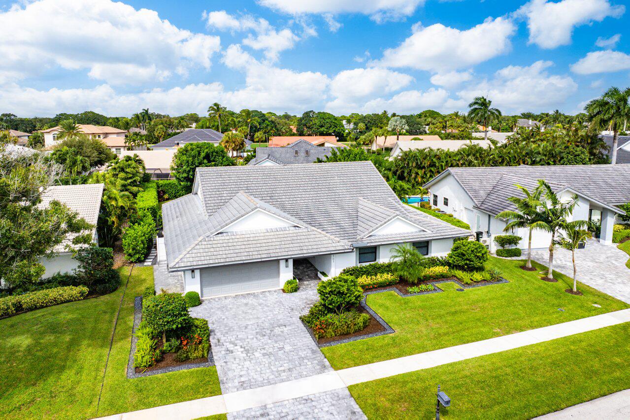 3707 Red Maple Circle Delray Beach, FL 33445 - Photo 38 of 39 a aerial view of a house with a garden